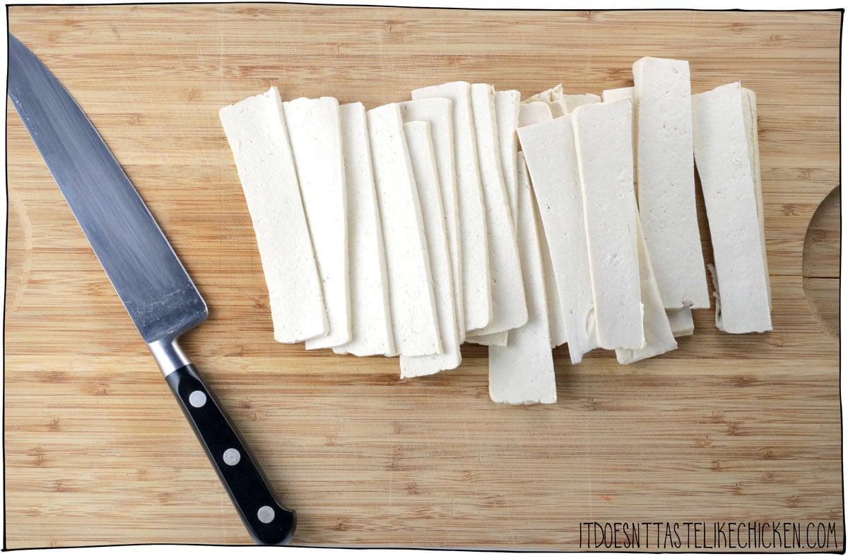 Slice the tofu in to thin, bacon-sized strips.