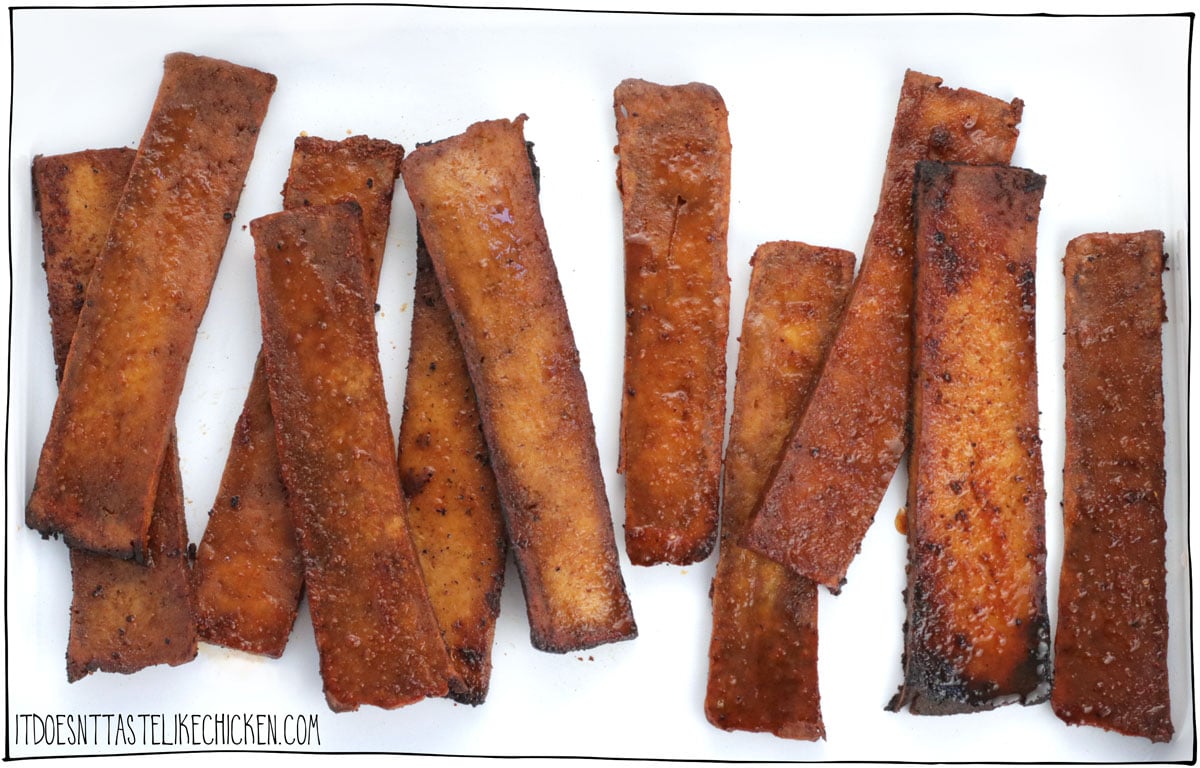 This quick and easy vegan bacon recipe is crispy, chewy, smoky delicious, and made with just 6 ingredients! Tofu strips are marinated in a salty, sweet, smoky marinade that tastes just like bacon. This tofu bacon can marinate in the fridge for up to 3 days so you can prep this ahead of time, and cook it up fresh. Cook it in your air-fryer, bake it, or pan fry it. Perfect for a stress-free morning. It’s so easy-peasy you’re gonna love it! 