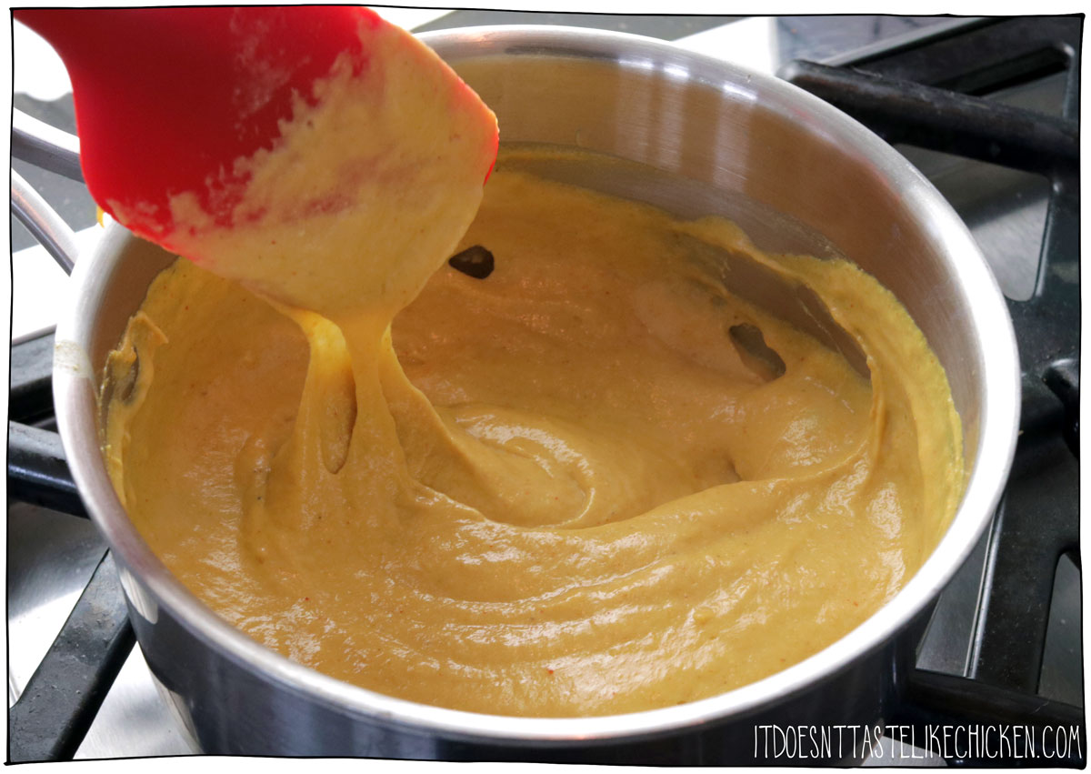 Cook the vegan cheese sauce until it is melty and gooey