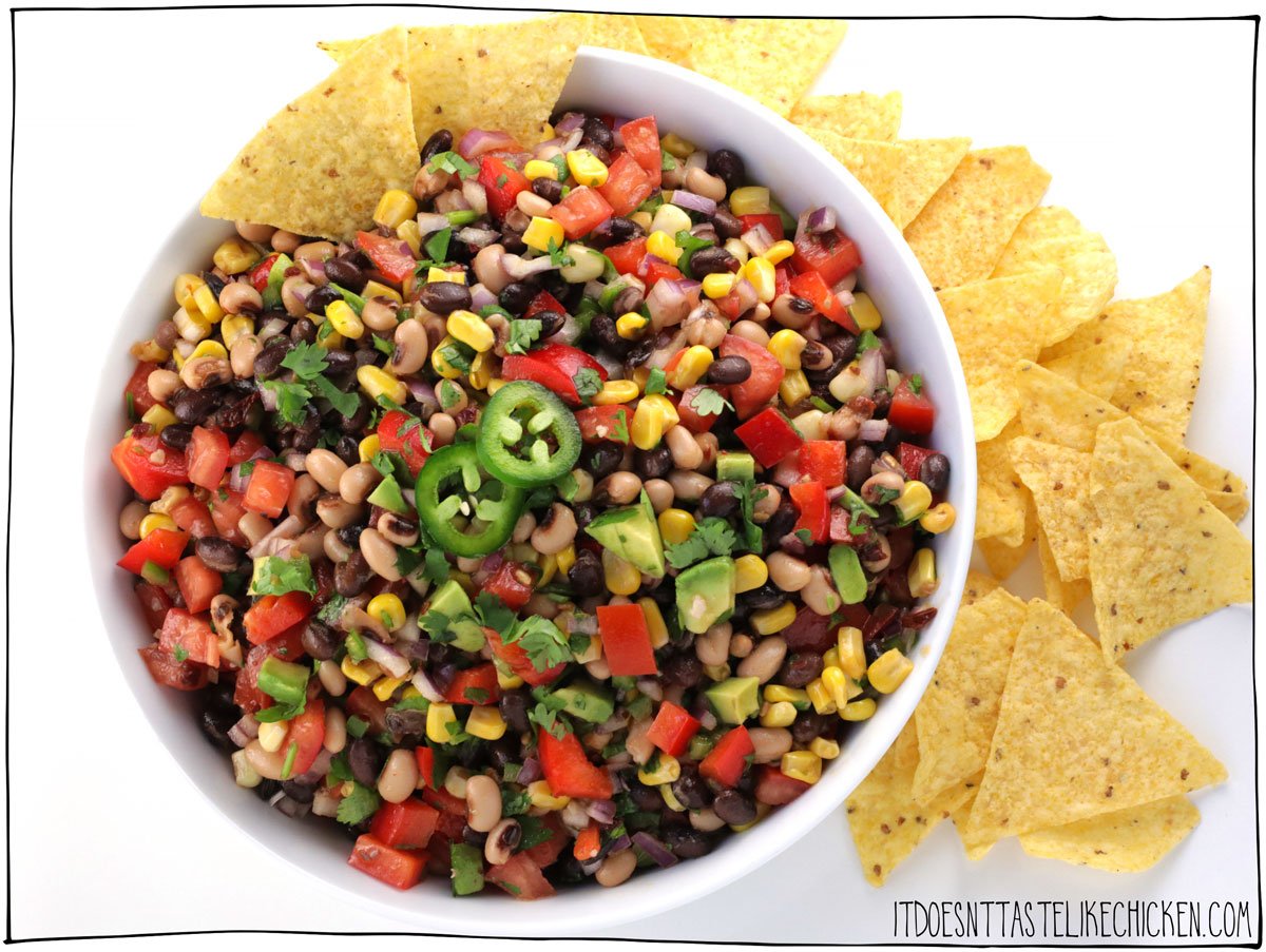 The Best Cowboy Caviar is super quick and easy to whip up and can be enjoyed as a dip with tortilla chips or could be served as a side dish. With a zesty lime and smoky chipotle dressing, this recipe is perfect for potlucks or BBQ's. This delicious summer appetizer is a real crowd pleaser! #itdoesnttastelikechicken #veganrecipe #potluck