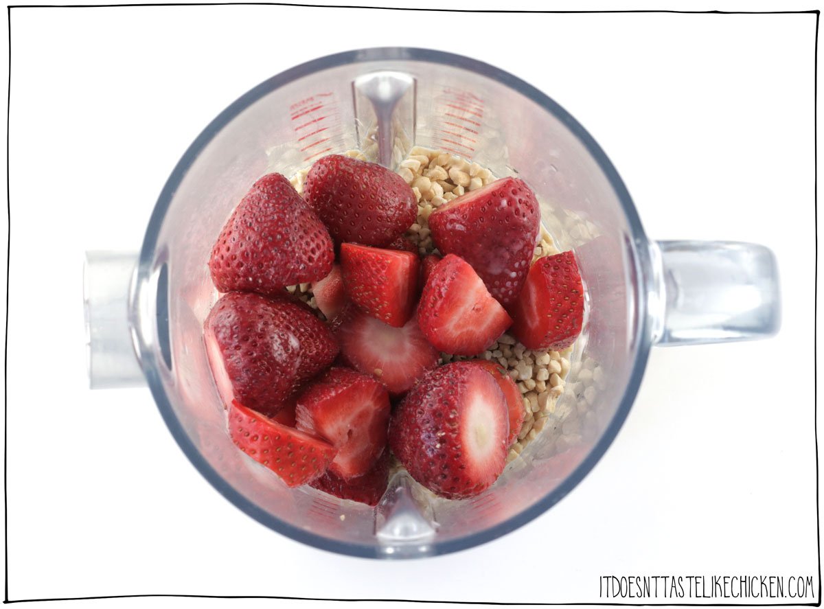 Add the cashews, plant-based milk, strawberries, sugar, and vanilla to your blender.