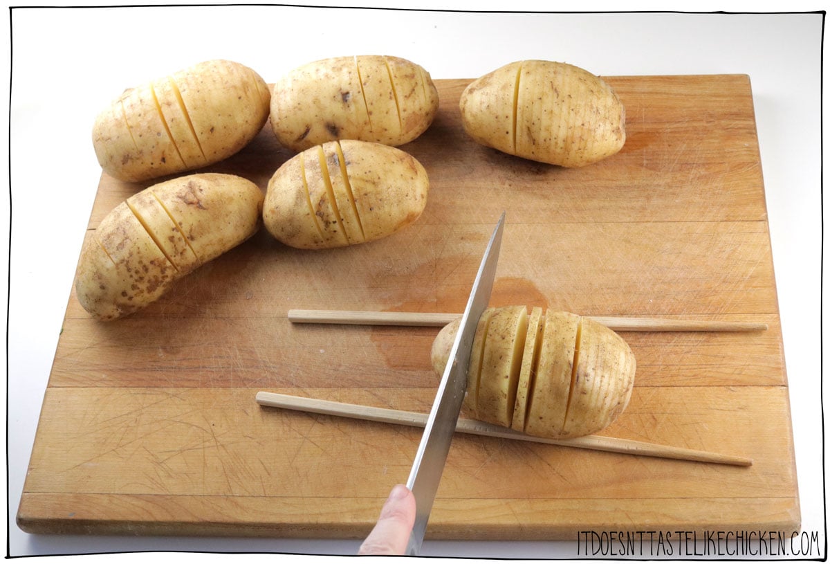 Cut thin slices into the potatoes.