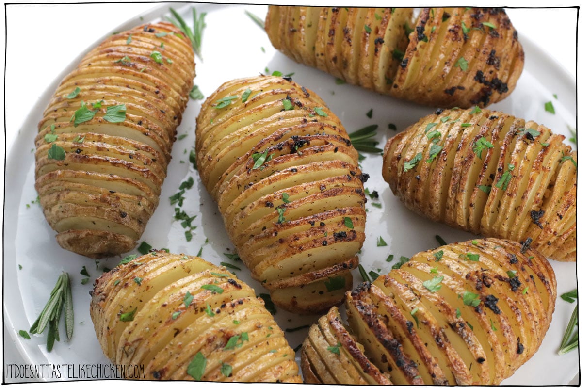 Baked potatoes never looked so good!  Garlic Hasselback Potatoes are the perfect side dish when you want to really impress.  Seasoned with garlic and rosemary, and then fried to a golden brown, they are tender on the inside and lightly crispy on the outside.  #itdoesnttastelikechicken #thanksgiving #potatoes