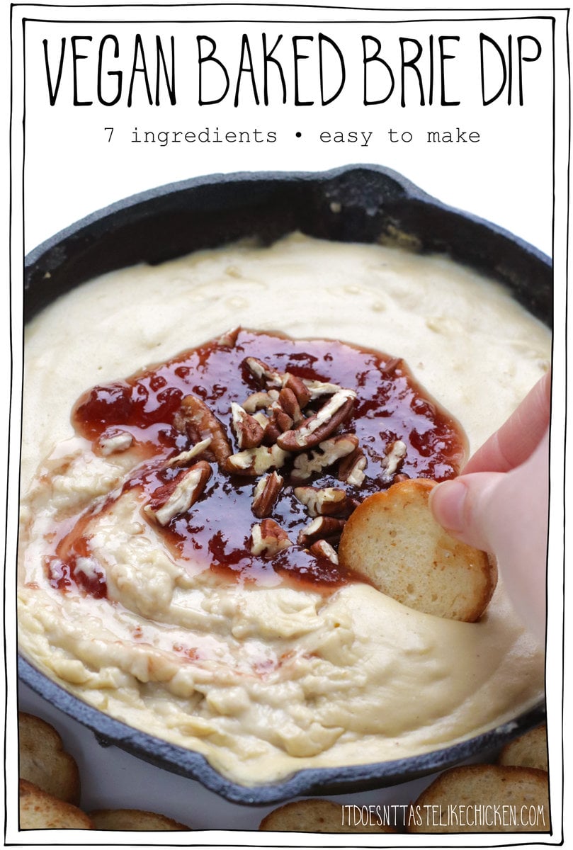 Did you know that you can make a homemade vegan baked brie dip with just 7 simple ingredients? You can, and wow is it amazingly delicious! Creamy, cheesy, gooey, and tastes just like brie except totally dairy free! This crowd-pleasing recipe is the perfect holiday party appetizer. #itdoesnttastelikechicken #vegancheese #veganappetizer
