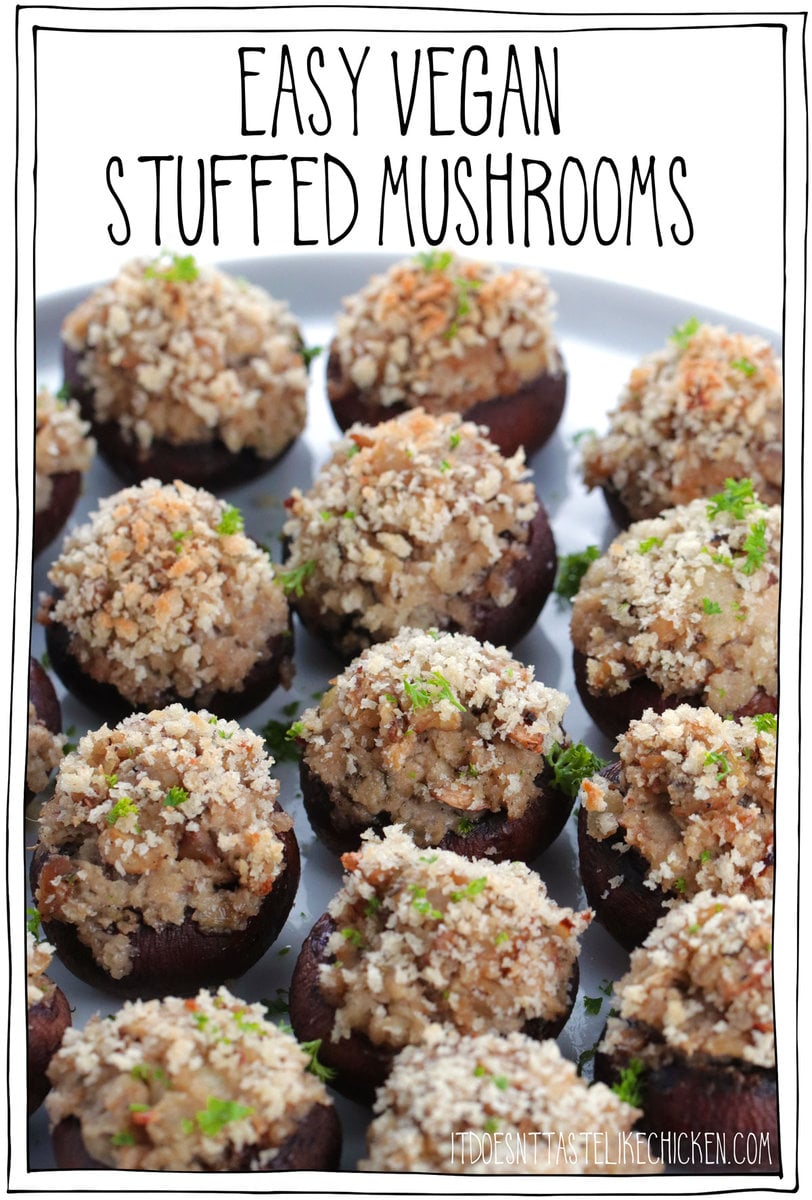 Easy Vegan Stuffed Mushrooms are the perfect party appetizer or they make a great side dish too!  They look fancy but are easy to make.  Mushroom caps are stuffed with vegan cream cheese, fried onions, garlic, panko and seasoning, then topped with more panko that bakes to a crispy golden topping.  These delicious, bite-sized, snacks are pop-so delicious!  #itdoesnttastelikechicken #veganappetizer #appetizer