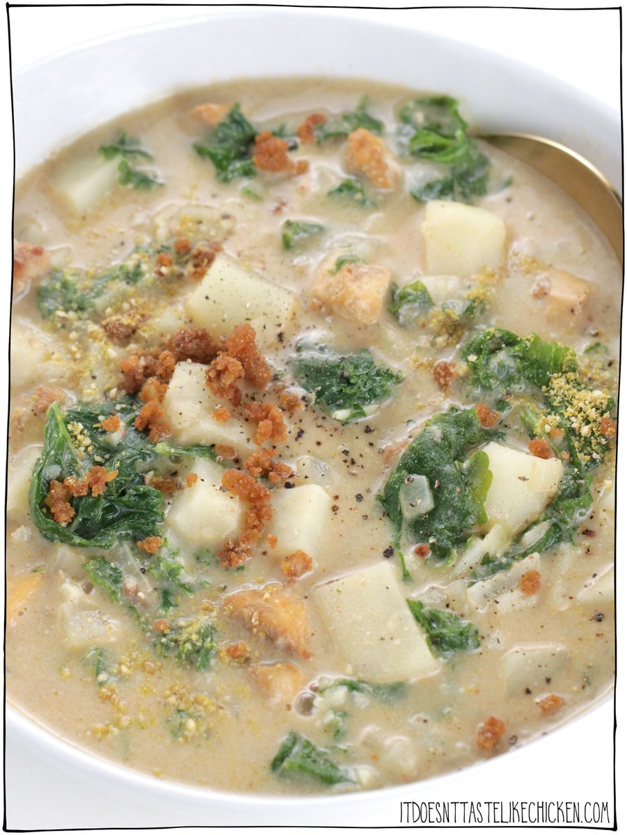 Olive Garden's Zuppa Toscana soup recipe- but veganized! Vegan Zuppa Toscana is lusciously creamy and loaded with potato, kale, and homemade tofu sausage. This soup recipe tastes like comfort food but is actually healthy, and it's easy enough to prepare for an easy weeknight dinner! #itdoesnttastelikechicken #veganrecipes #soup
