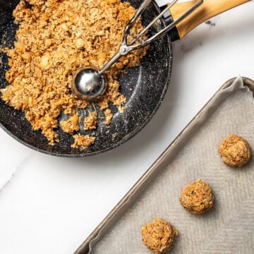 Vegan meatballs shaped with cookie dough scoop.