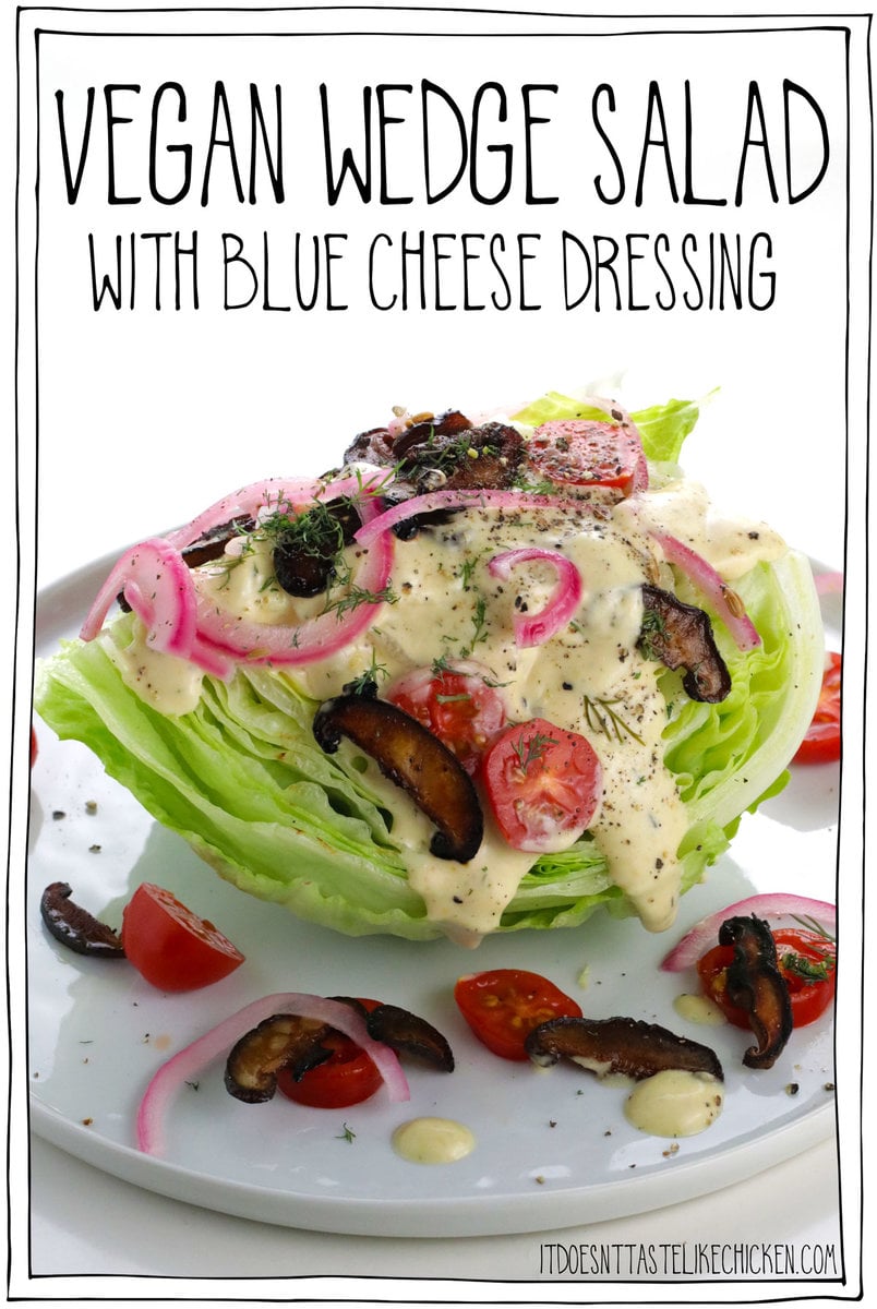 This Vegan Wedge Salad Recipe is topped with chunks of vegan bacon, cherry tomatoes, pickled red onions, and an insanely delicious vegan blue cheese dressing!  This recipe is quick and easy to prepare (takes less than 15 minutes to prepare) and is perfect for a fancy appetizer or side dish.  #it ​​doesn't taste like chicken #salad #vegan recipes