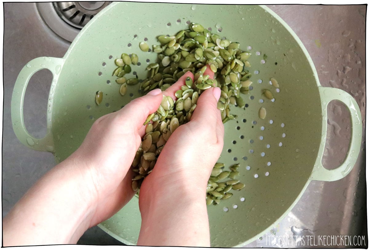 Rub the seeds together to remove the outer skins.