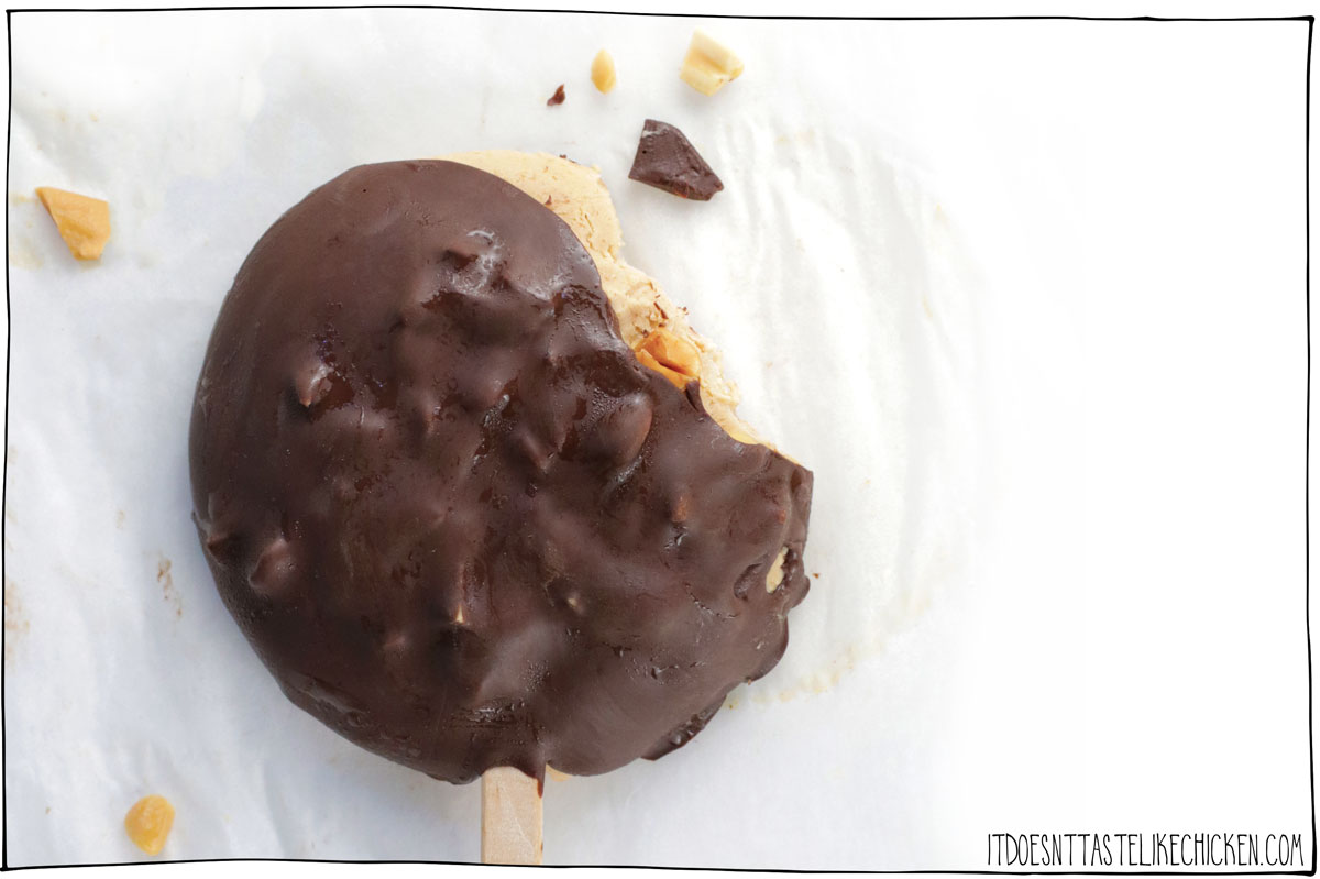 These Vegan Ice Cream Bars are made with just 7 ingredients, and only a take few minutes of prep (plus freezing time). These bars are easy to make and so much tastier and cheaper than store-bought! The filling is a mixture of plant-based yogurt, peanut butter, sweetener, and crunchy roasted salted peanuts, all coated in a chocolate shell! 