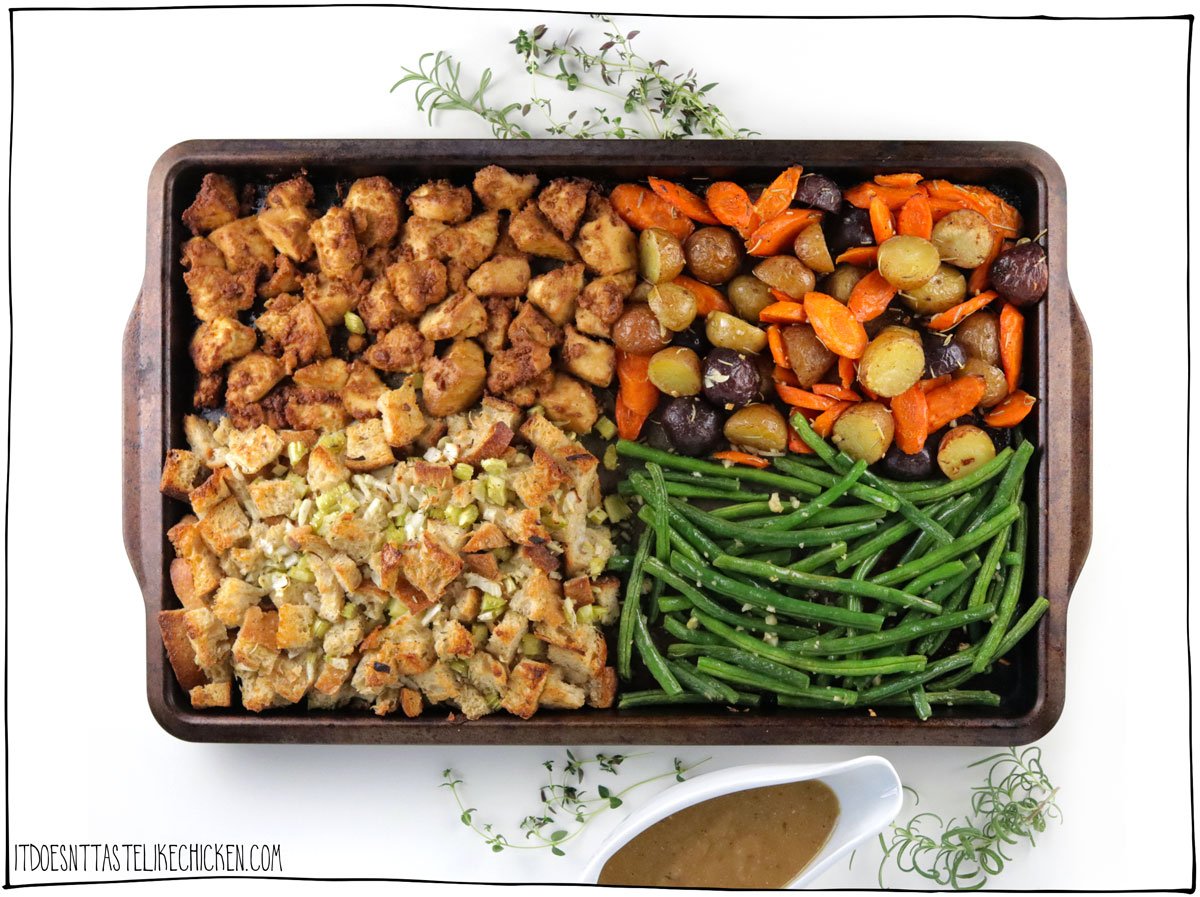 This Vegan Sheet Pan Thanksgiving Dinner is a delectable tribute to the flavors of Thanksgiving, and the best part is that you can enjoy it any day of the week. It's a complete feast including a crispy-on-the-outside, creamy-on-the-inside stuffing, tofu bites that are seasoned to taste like turkey, perfectly roasted potatoes and carrots, and garlicky green beans. It's easy to prepare, and it all bakes together on a sheet pan!