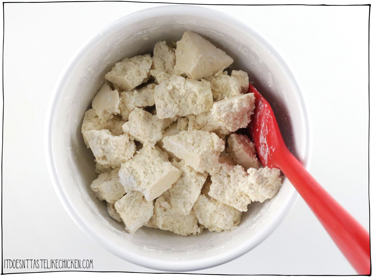 Tear the tofu into chunks and toss it in cornstarch.