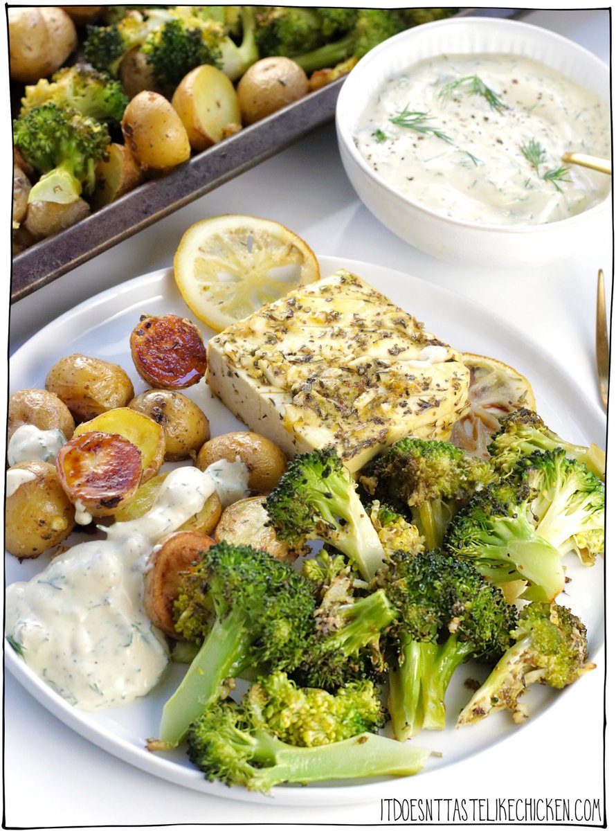 Vegan Sheet Pan Lemon Garlic Tofu Dinner is an all-in-one meal. Flavorful garlicky tofu steaks, accompanied by perfectly golden roasted potatoes, and tender roasted broccoli, served with dairy-free yogurt dill sauce that's bursting with zesty freshness. YUM! This easy one-pan dinner is quick to make, and great for meal prep too!