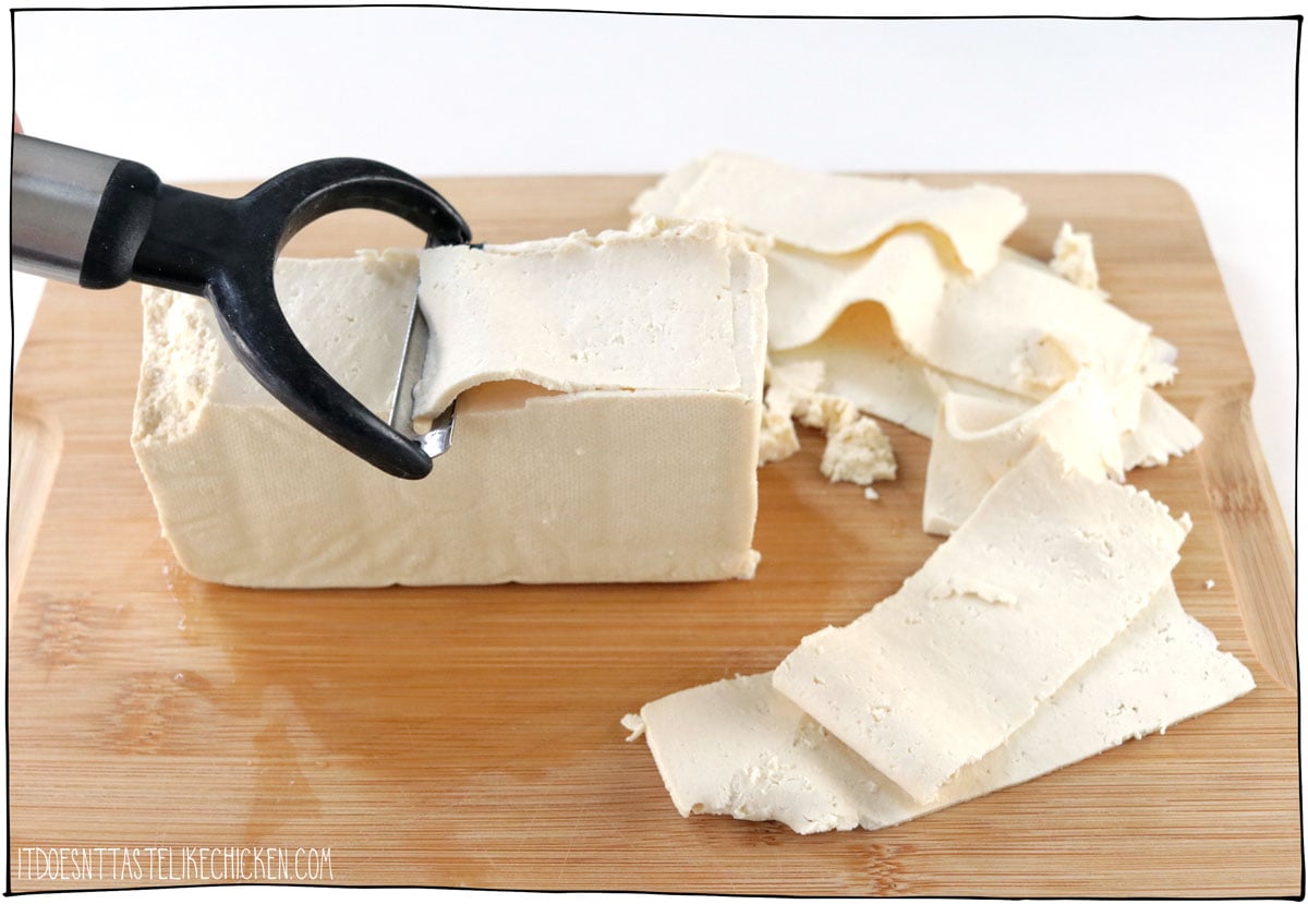 Use a potato peeler to slice the tofu super thin.