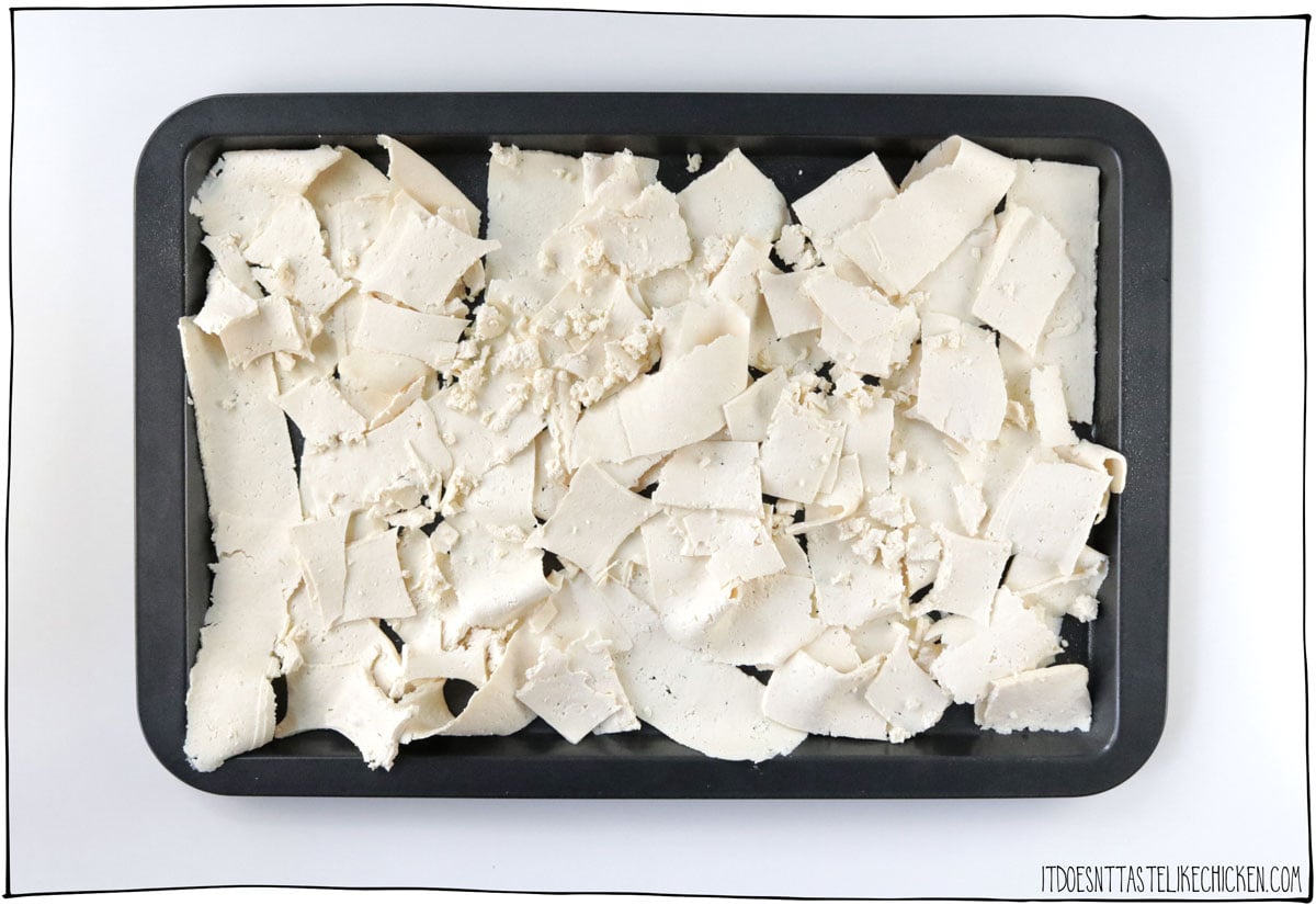 Spread all of the tofu out evenly over a greased baking sheet.