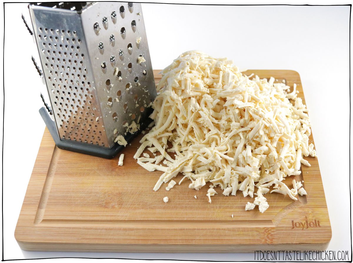 Grate the tofu using a cheese grater.