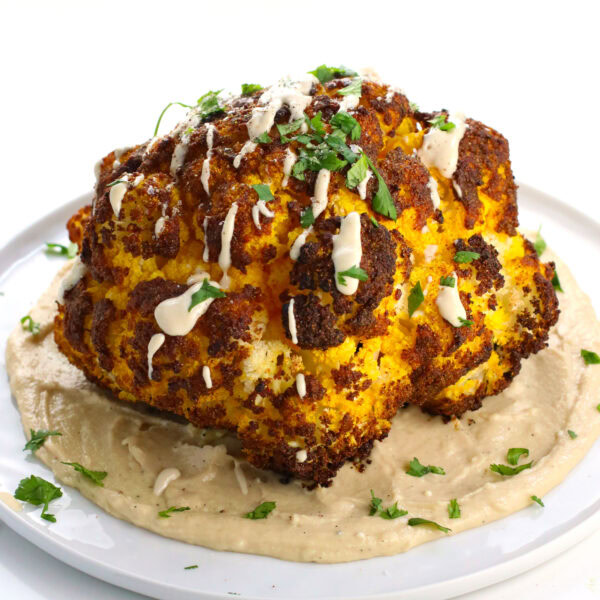 Whole Roasted Cauliflower with Tahini Sauce • It Doesn't Taste Like Chicken