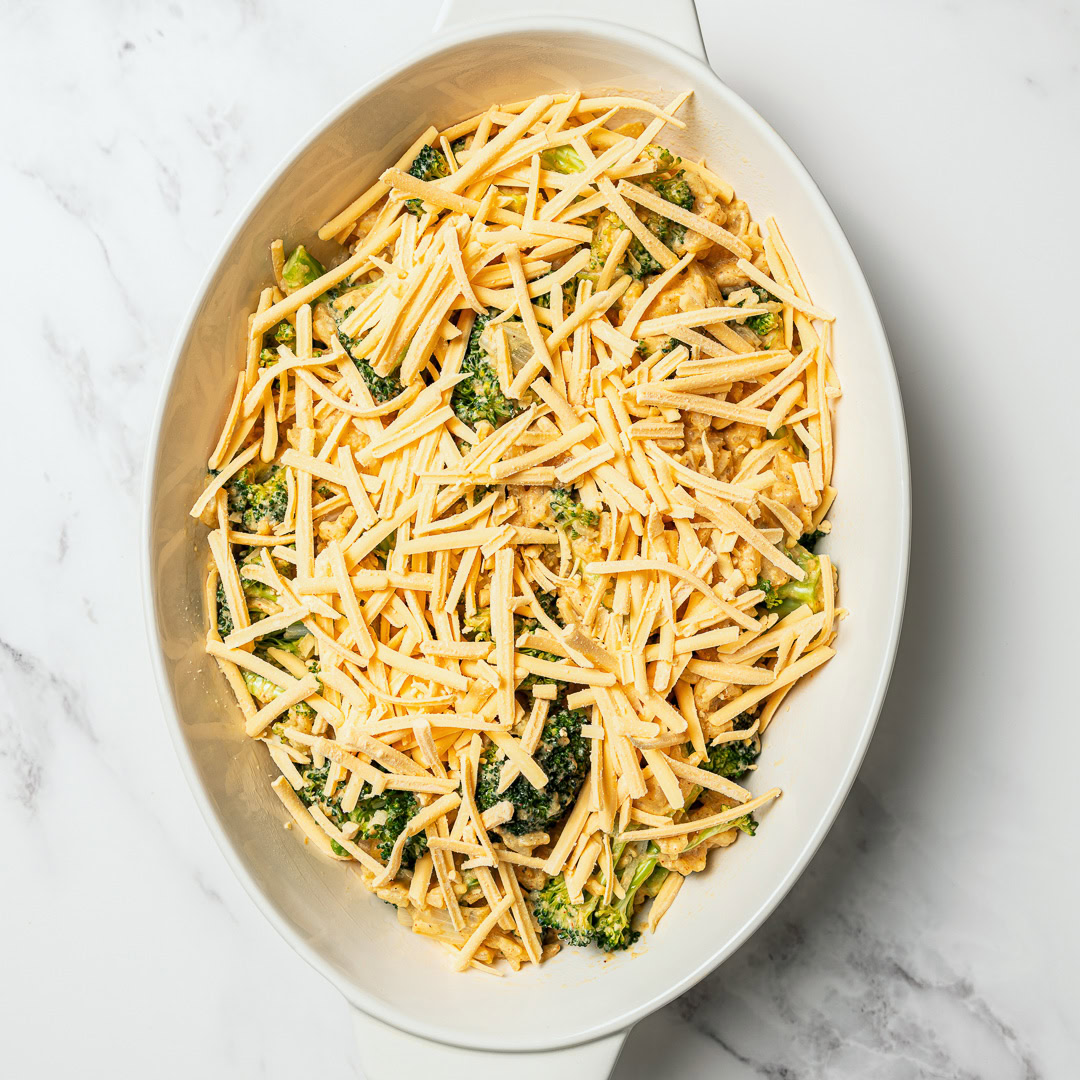 This easy Vegan Broccoli Rice Casserole is a crowd-pleaser with creamy cheese sauce, broccoli and fluffy rice. Works as a main dish or side! Vegan broccoli rice casserole before baking.