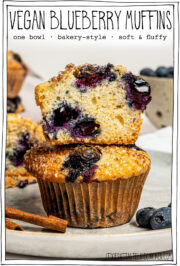 Stack of 2 muffins with text overlay that reads vegan blueberry muffins.
