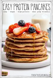 Stack of pancakes with syrup and berries with text overlay that reads easy protein pancakes.