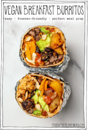 Two foil-wrapped burritos with text overlay that reads vegan breakfast burritos.