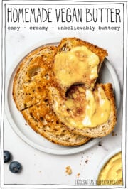 Two slices of toast on plate with text overlay that reads homemade vegan butter.