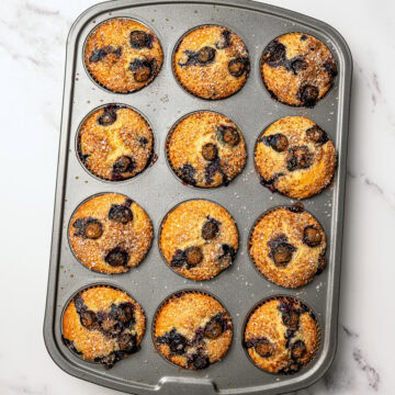 Vegan blueberry muffins in pan.