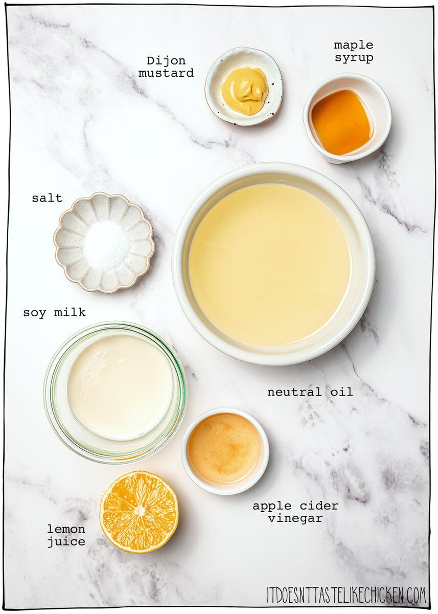 This thick, creamy vegan mayo is made in 5 minutes with soy milk! It’s the BEST fool-proof recipe, egg-free, and better than store-bought. Ingredients for vegan mayo with labels.