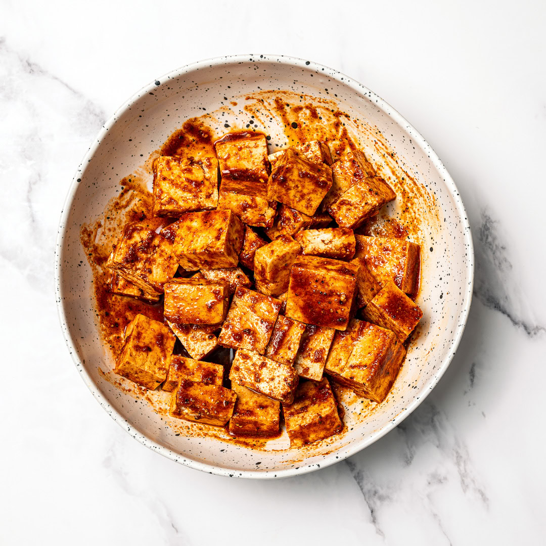 Marinated tofu in bowl.
