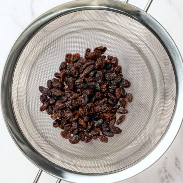 Raisins in colander.