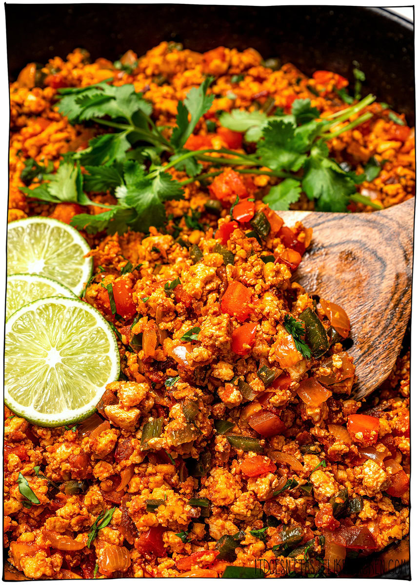 These smoky, saucy vegan sofritas are made in one pan with tofu, chipotle, and spices. Perfect for tacos, bowls, burritos, and meal prep! Stirring vegan tofu sofritas in skillet.