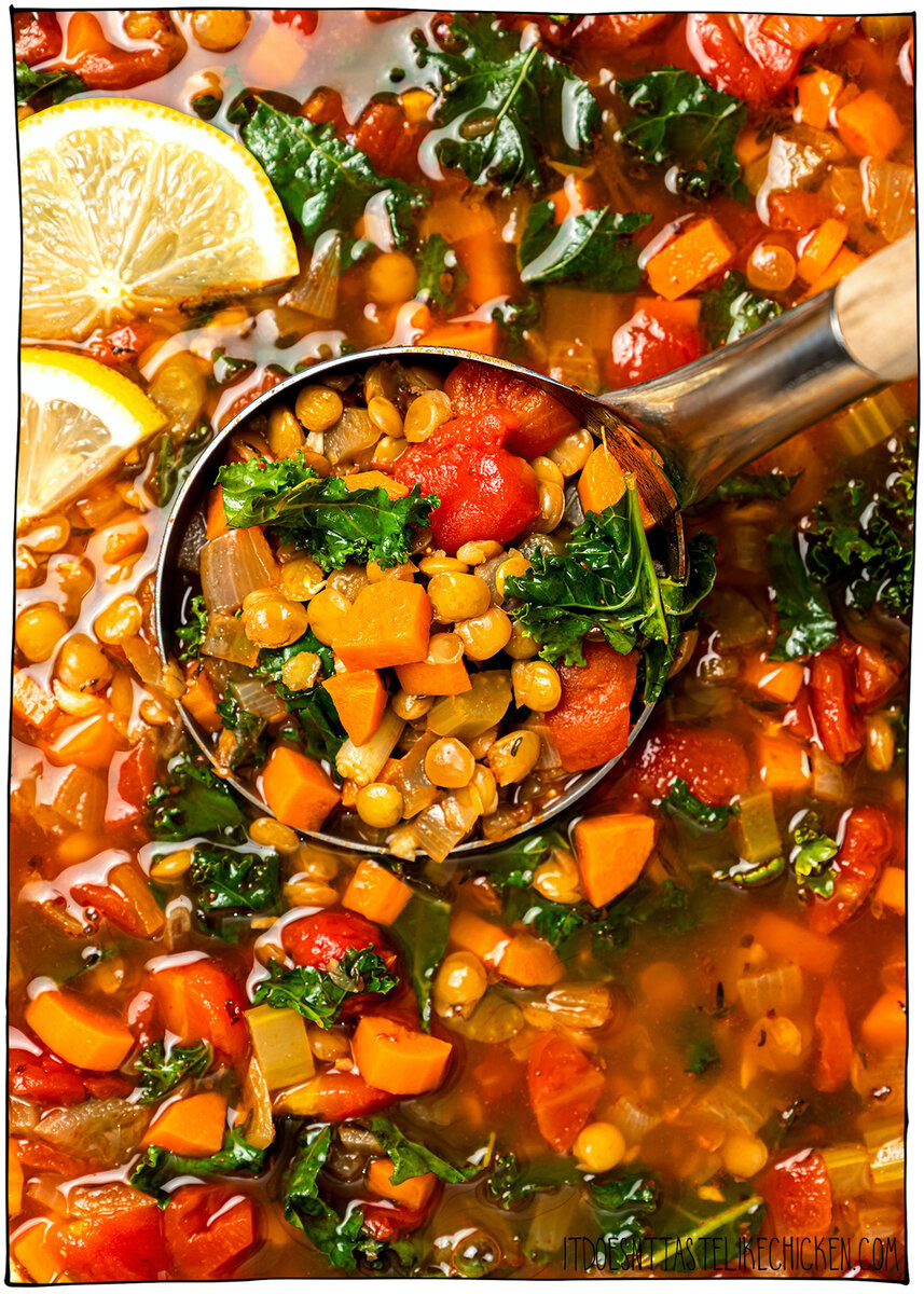 This easy lentil soup is a cozy one-pot recipe made with simple pantry ingredients! A hearty, healthy vegan meal perfect for meal prep. Ladle of lentil soup in pot.