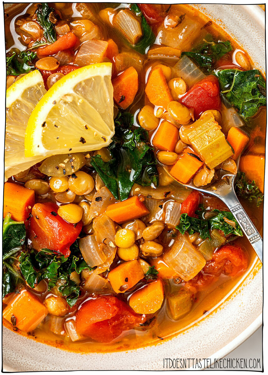 This easy lentil soup is a cozy one-pot recipe made with simple pantry ingredients! A hearty, healthy vegan meal perfect for meal prep. Bowl of lentil soup with spoon.