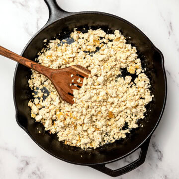 Crumbled tofu in skillet.
