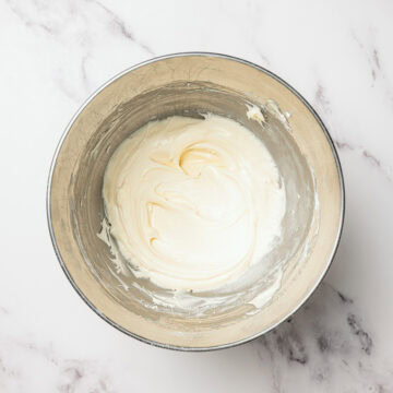 Bowl of vegan cream cheese frosting.
