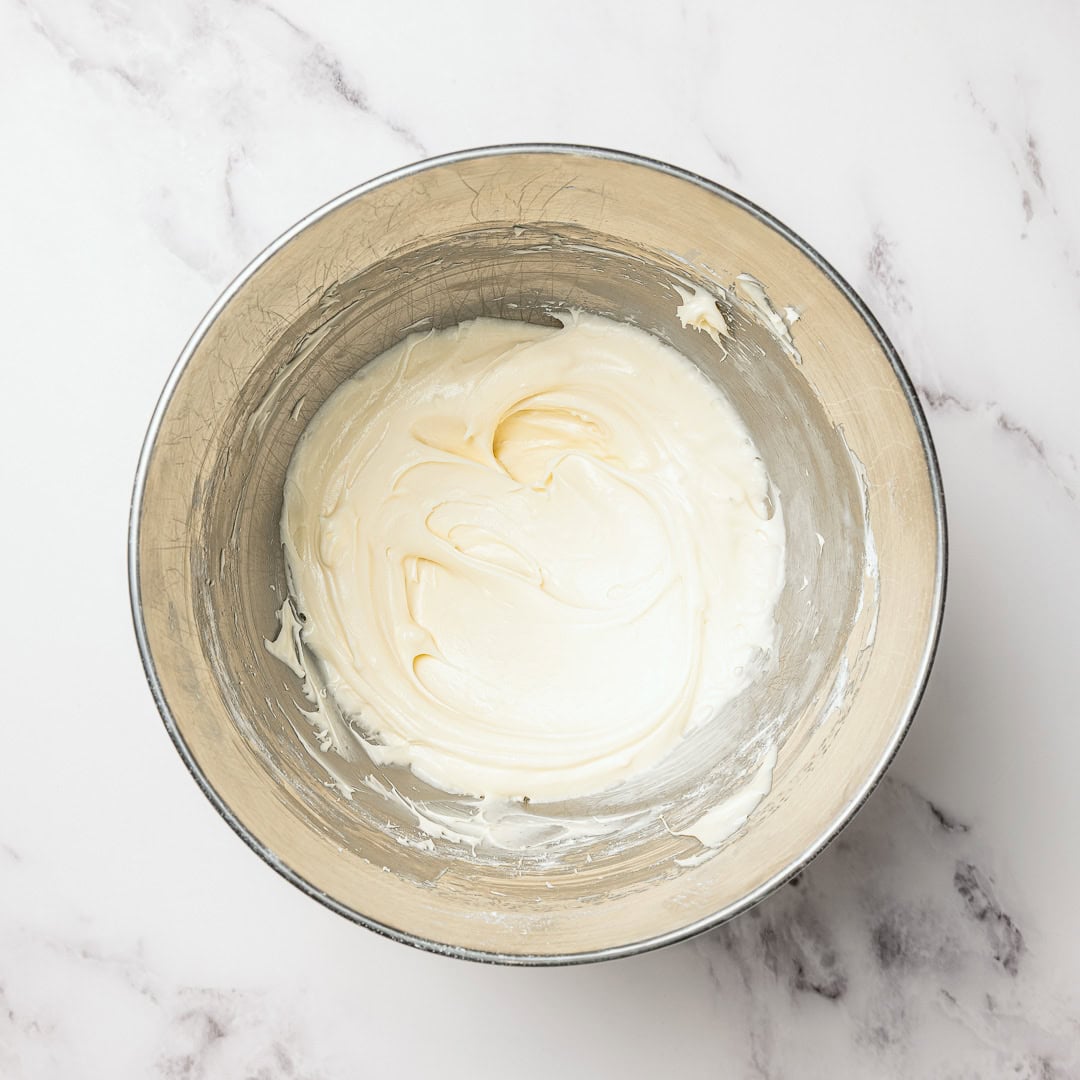 Bowl of vegan cream cheese frosting.