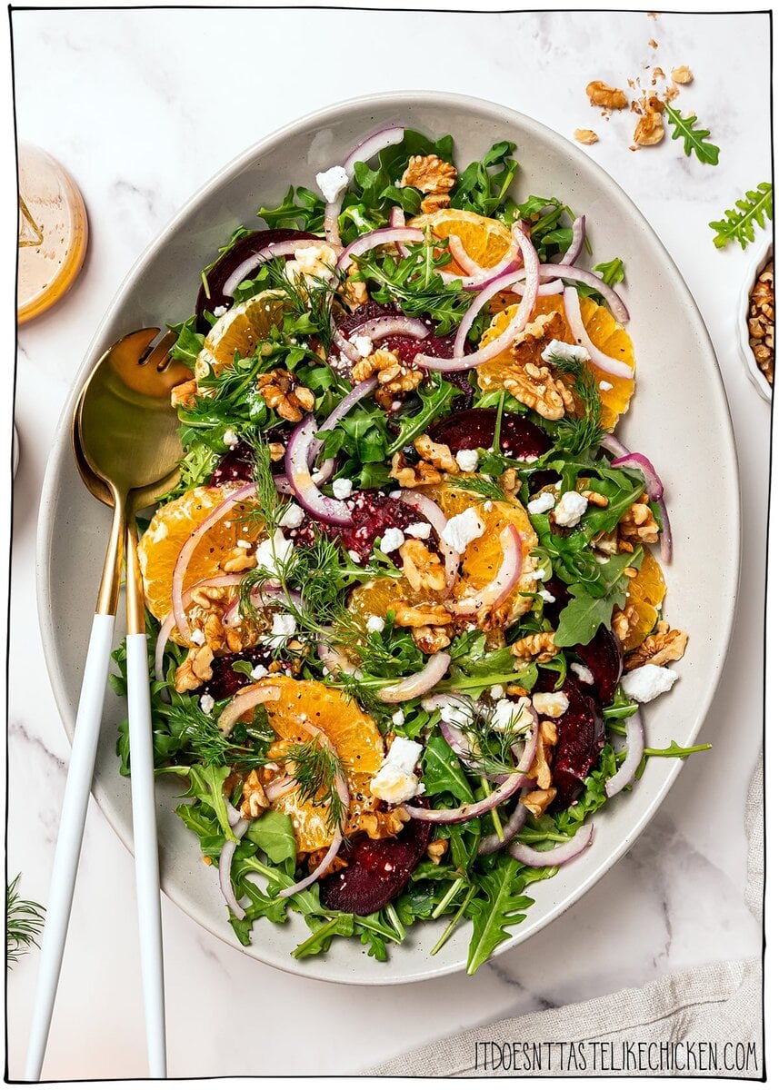 This roasted beet salad is fresh, vibrant and flavorful, with sweet roasted beets, juicy oranges and a tangy dressing. Elegant yet simple! Roasted beet salad on serving platter.