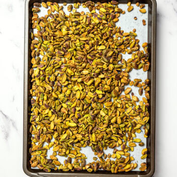 Pistachios on sheet pan.