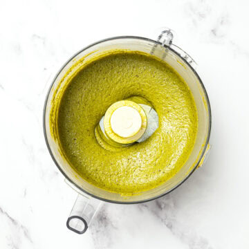 Homemade pistachio butter in food processor.