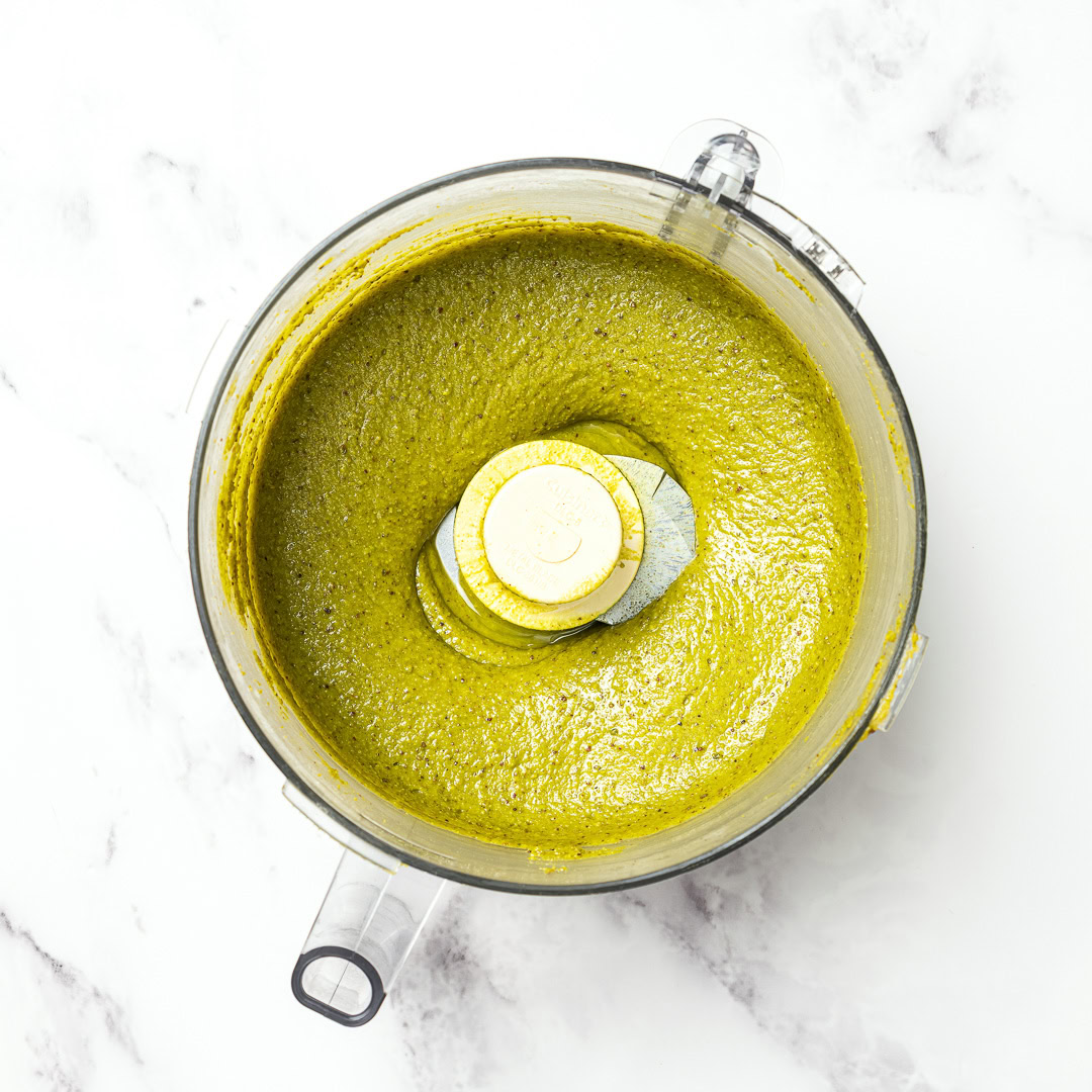 Roasted pistachios blend into a smooth homemade pistachio butter that tastes amazing on toast or straight from the spoon. Just 1 ingredient! Homemade pistachio butter in food processor.