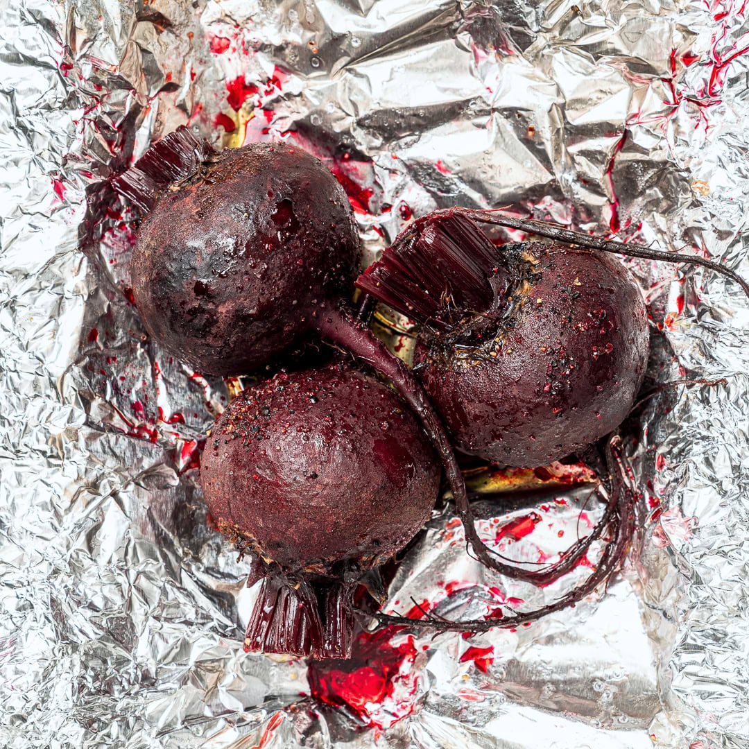 This roasted beet salad is fresh, vibrant and flavorful, with sweet roasted beets, juicy oranges and a tangy dressing. Elegant yet simple! Roasted beets on sheet of foil.
