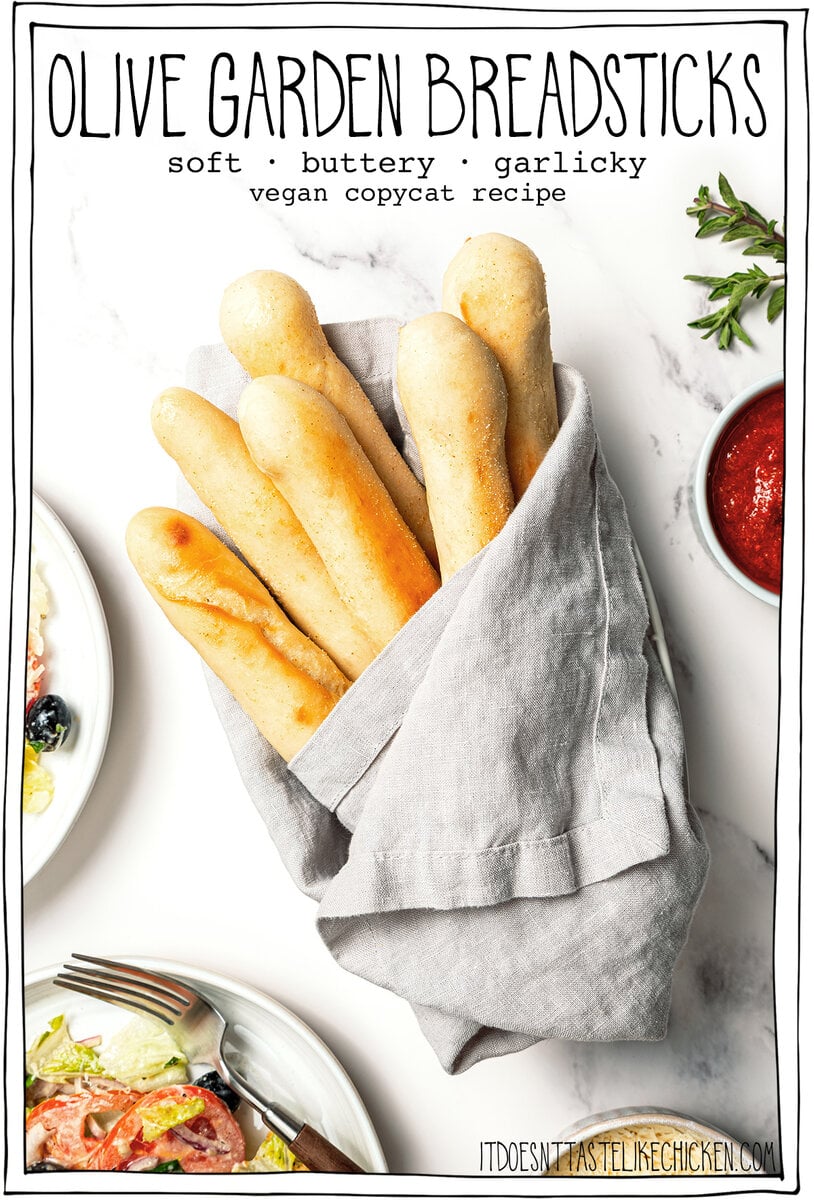 Breadsticks wrapped in linen towel with text overlay that reads Olive Garden breadsticks.