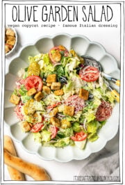 Bowl of salad with text overlay that reads Olive Garden salad.