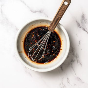Whisk in bowl of soy dipping sauce.