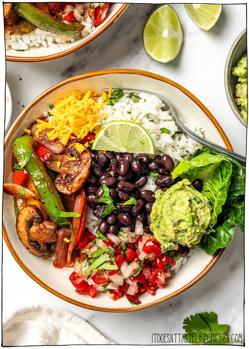 This easy Chipotle rice recipe is fluffy, lightly seasoned, and finished with fresh lime juice and cilantro for that signature fresh flavor! Burrito bowl with Chipotle-style cilantro lime rice.