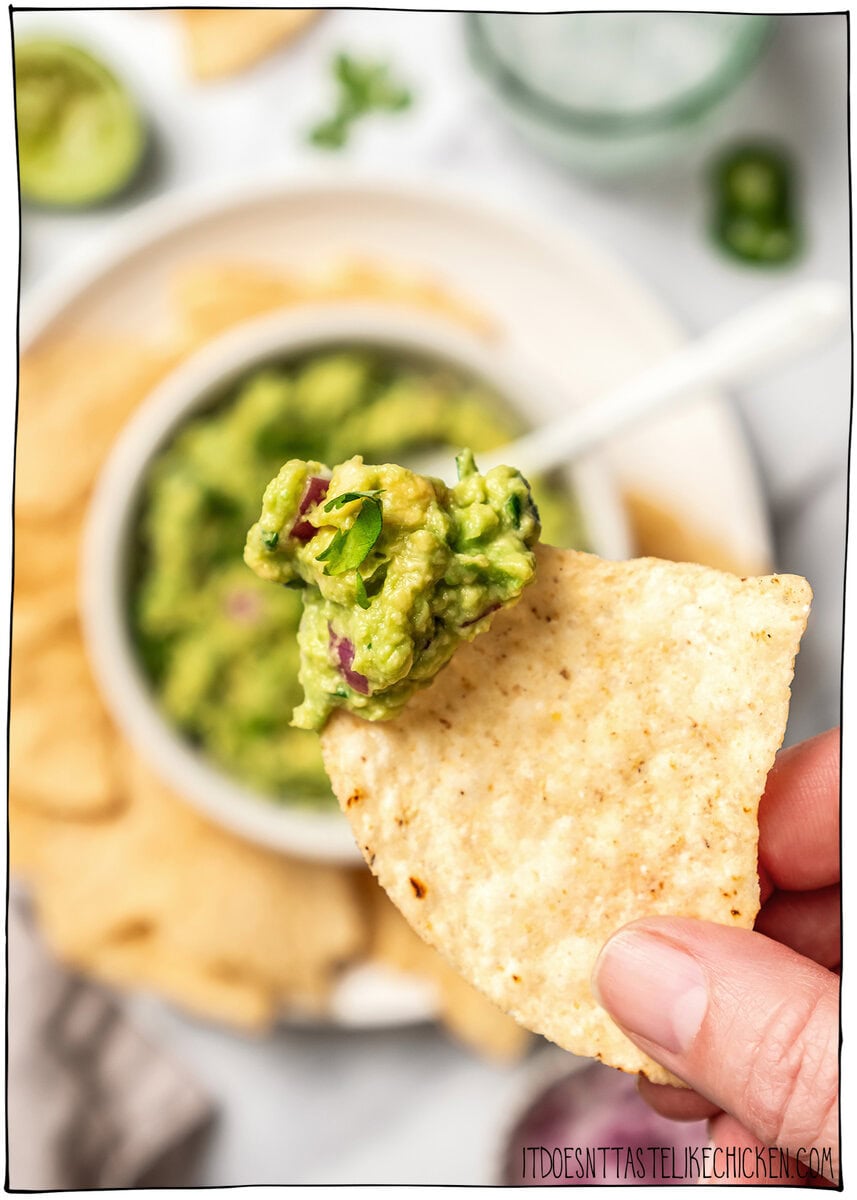 This easy Chipotle guacamole recipe is creamy, bright, and packed with fresh flavor, just like the restaurant version. Only 5 ingredients! Chipotle guacamole on tortilla chip.