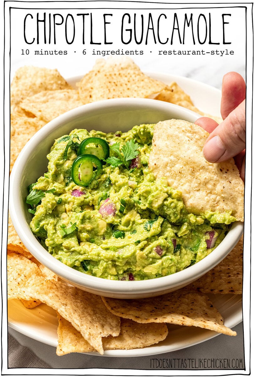 This easy Chipotle guacamole recipe is creamy, bright, and packed with fresh flavor, just like the restaurant version. Only 5 ingredients! Chip dipping into bowl of guacamole with text overlay that reads Chipotle guacamole.