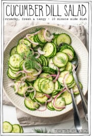 Cucumber salad in bowl with text overlay that reads cucumber dill salad.