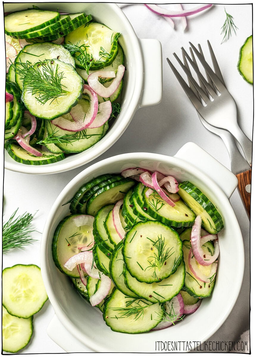 This easy cucumber dill salad is light, crisp, and refreshing, made with thinly sliced cucumbers, red onion, and a simple tangy vinaigrette. Two bowls of cucumber dill salad.