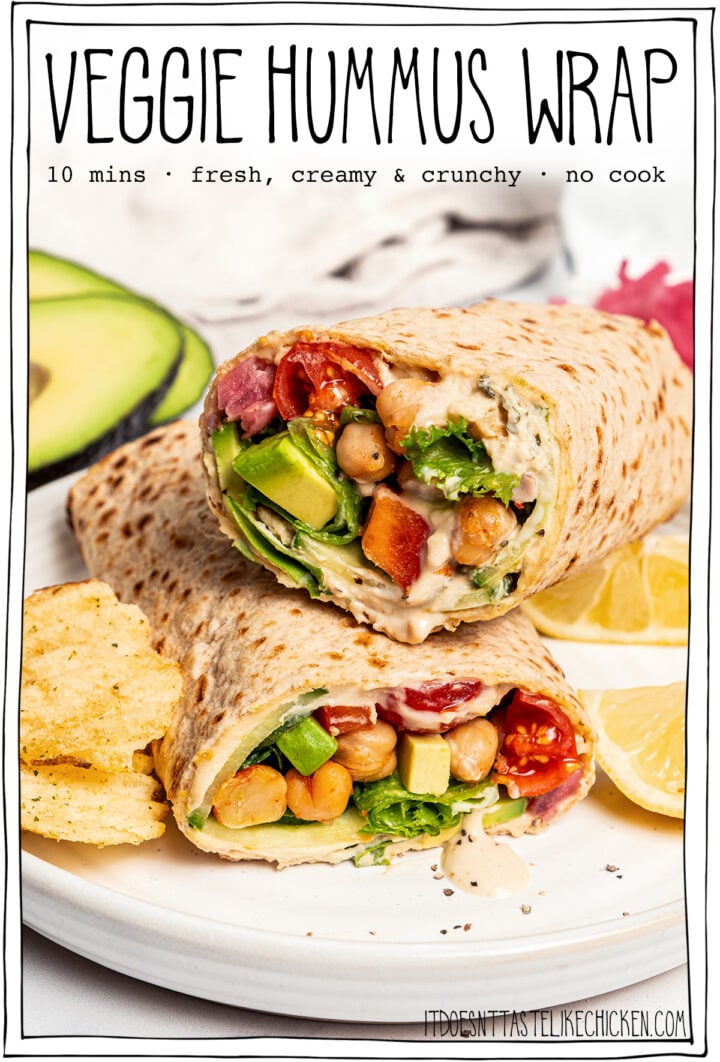 Stack of two wraps on plate with text overlay that reads veggie hummus wrap.